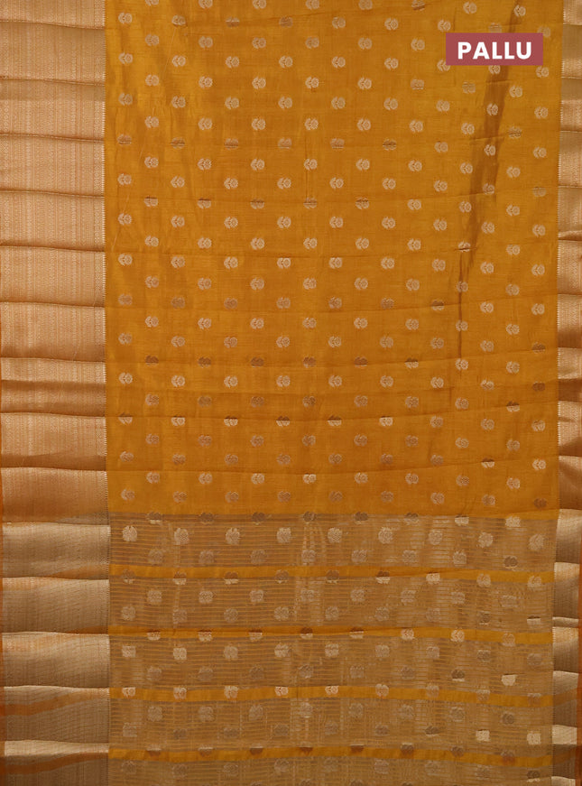 Semi raw silk saree mustard yellow with allover zari woven 1000 buttas and long zari woven border