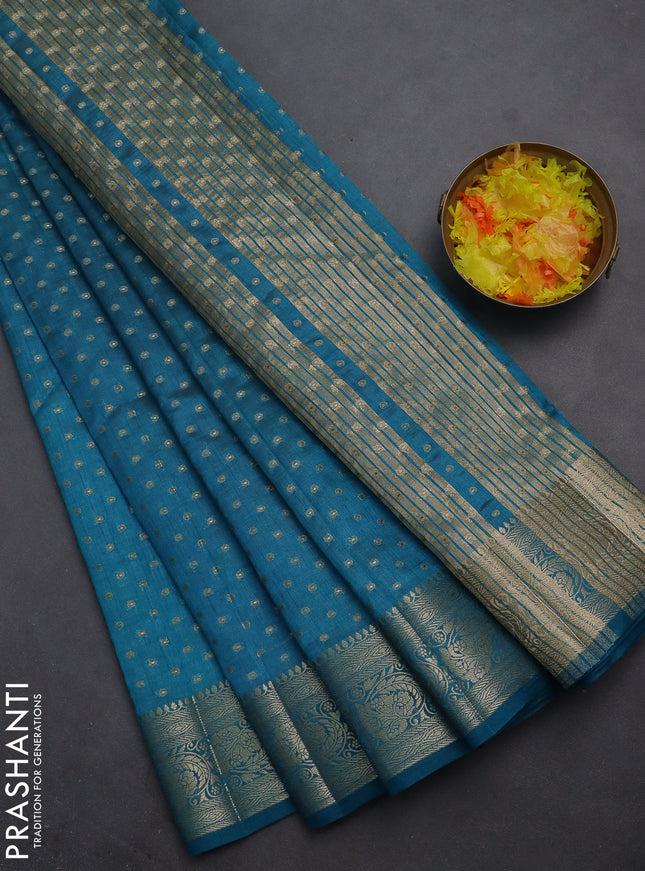 Semi raw silk saree cs blue with allover zari woven 1000 buttas and zari woven border