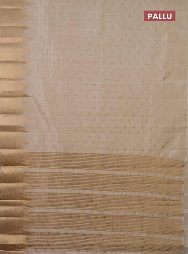 Semi raw silk saree cream with allover zari woven 1000 buttas and temple design zari woven border