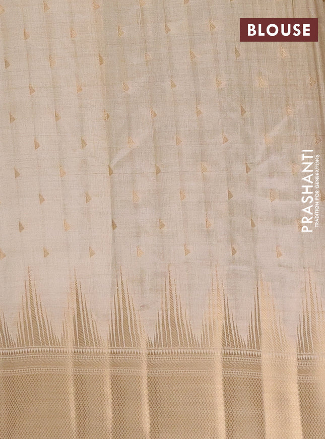 Semi raw silk saree cream with allover zari woven 1000 buttas and temple design zari woven border