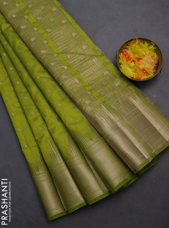 Semi raw silk saree light green with allover zari woven 1000 buttas and temple design zari woven border