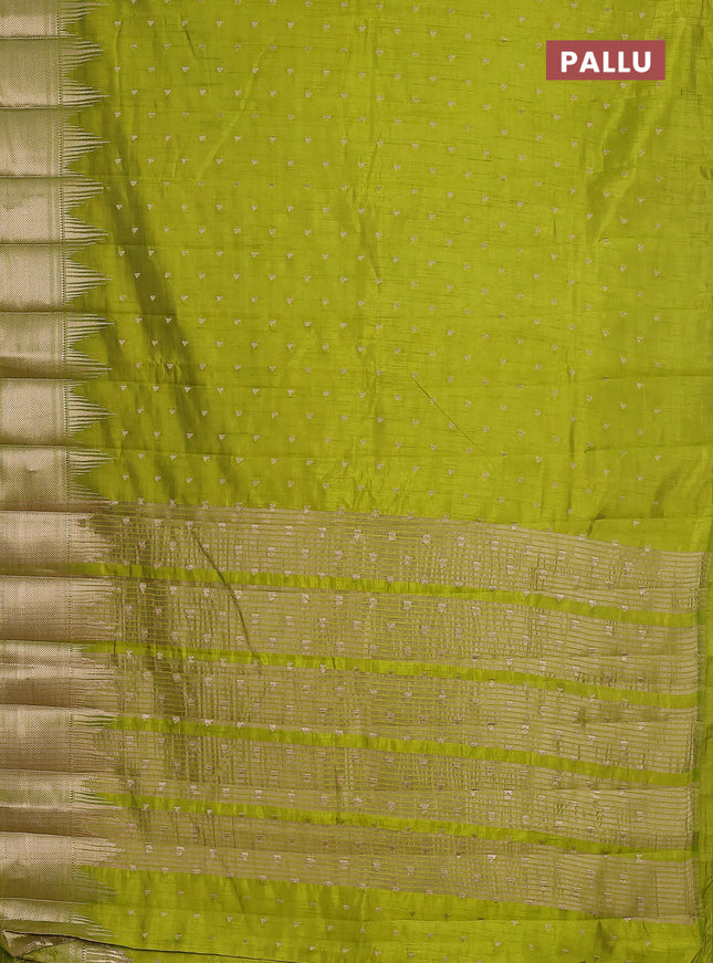 Semi raw silk saree light green with allover zari woven 1000 buttas and temple design zari woven border