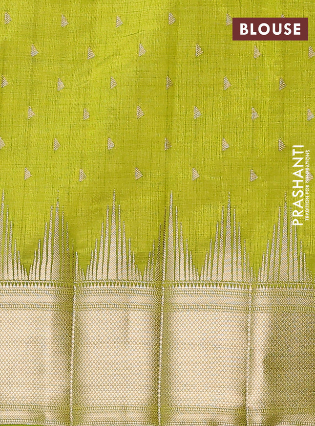 Semi raw silk saree light green with allover zari woven 1000 buttas and temple design zari woven border