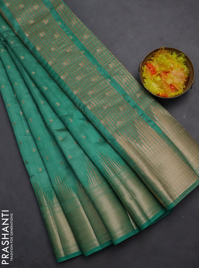 Semi raw silk saree teal green with allover zari woven 1000 buttas and temple design zari woven border