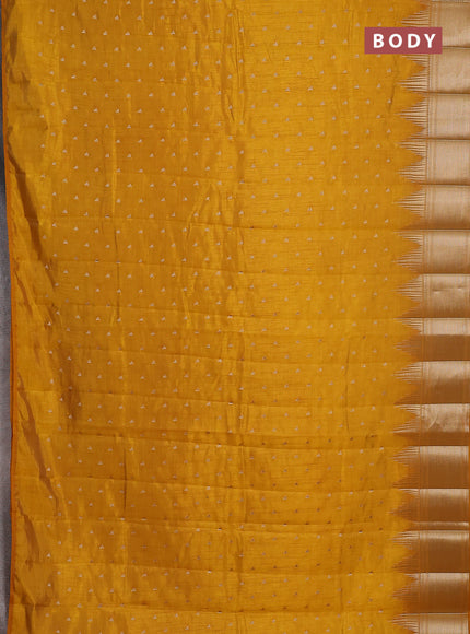Semi raw silk saree mustard yellow with allover zari woven 1000 buttas and temple design zari woven border