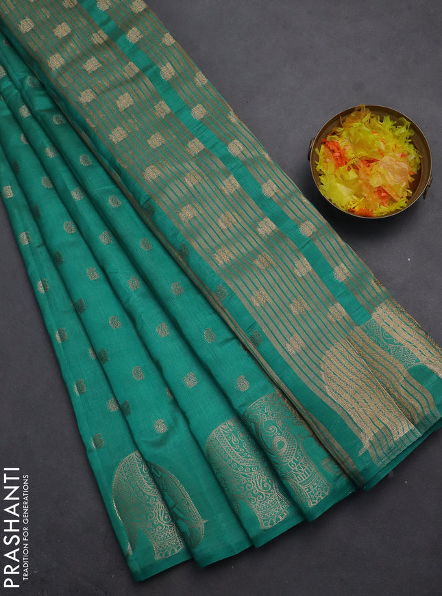 Semi raw silk saree teal blue with allover zari woven 1000 buttas and elephant design zari butta border