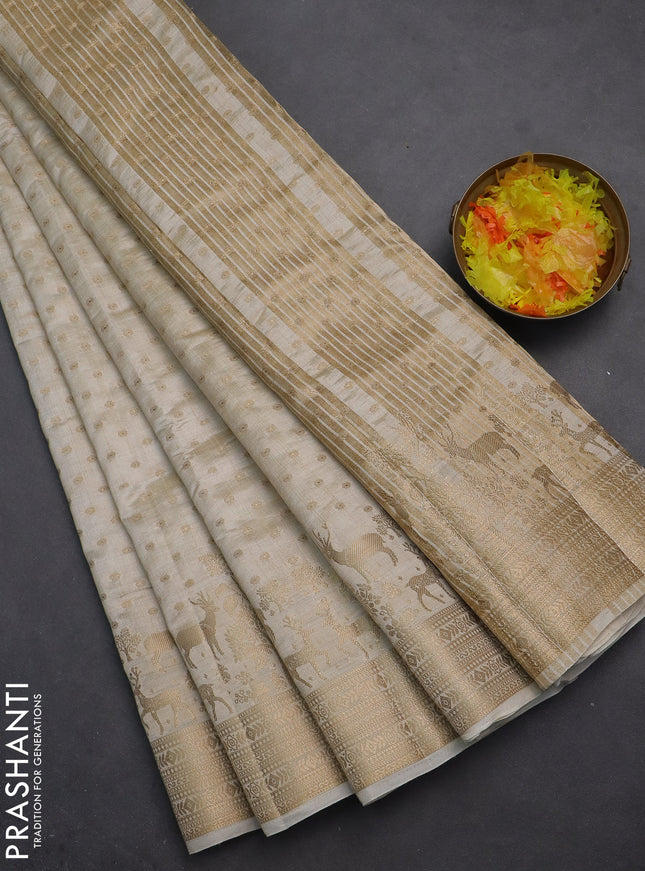 Semi raw silk saree cream with allover zari woven 1000 buttas and rich zari woven border