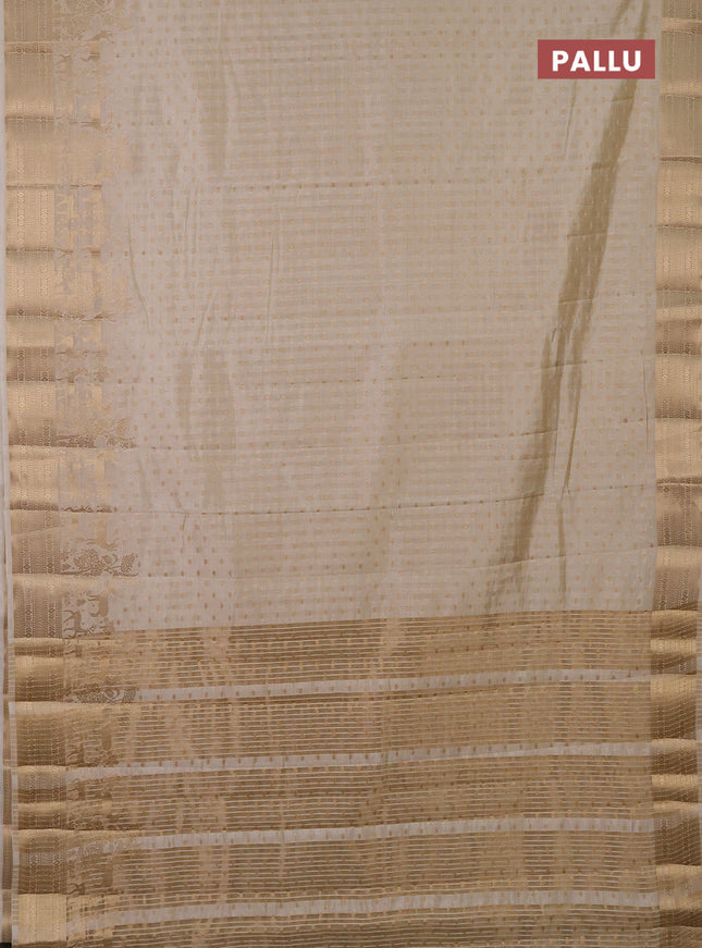 Semi raw silk saree cream with allover zari woven 1000 buttas and rich zari woven border
