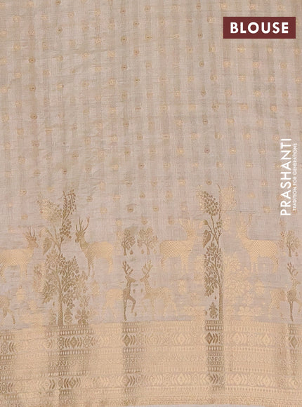 Semi raw silk saree cream with allover zari woven 1000 buttas and rich zari woven border