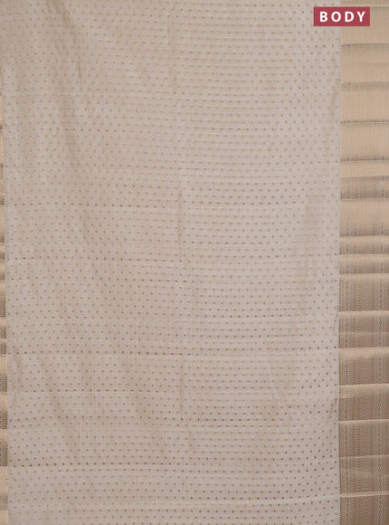 Semi raw silk saree cream with allover zari woven 1000 buttas and rich zari woven border