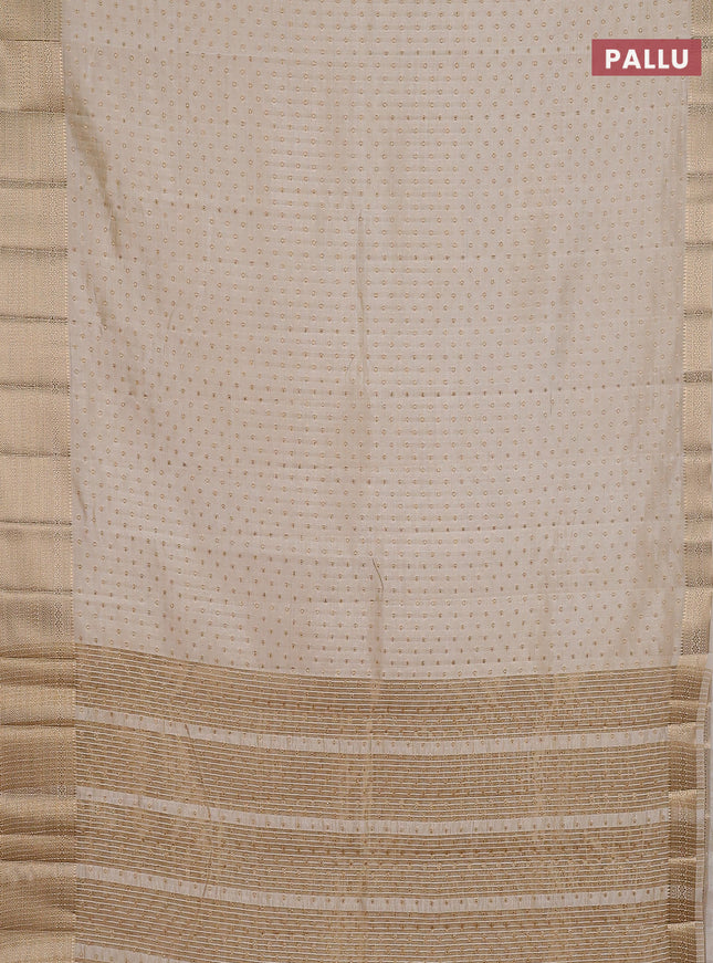 Semi raw silk saree cream with allover zari woven 1000 buttas and rich zari woven border