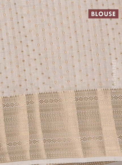 Semi raw silk saree cream with allover zari woven 1000 buttas and rich zari woven border