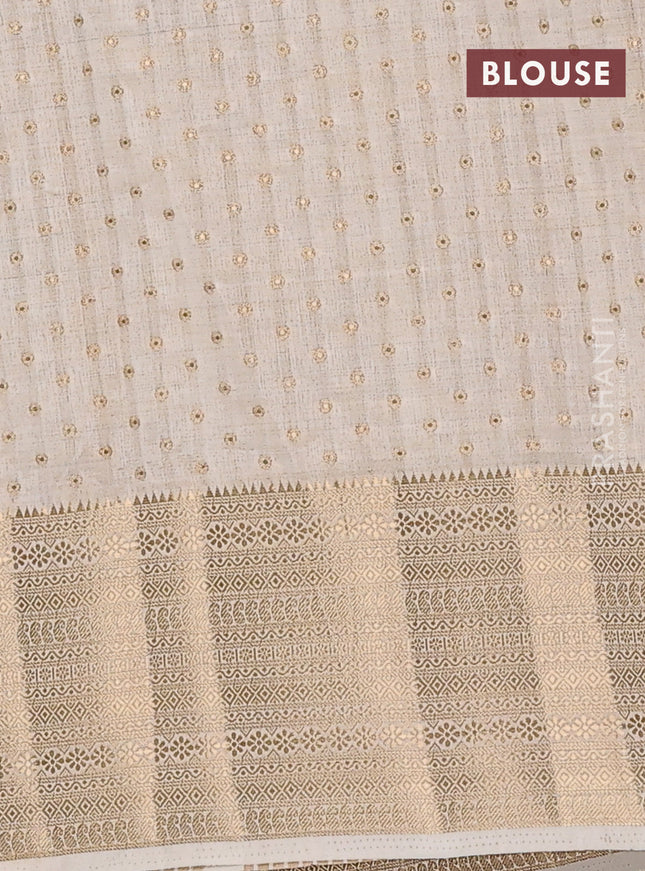 Semi raw silk saree cream with allover zari woven 1000 buttas and rich zari woven border