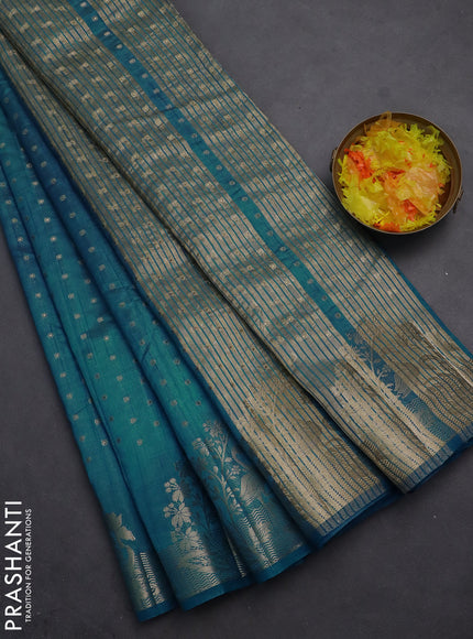 Semi raw silk saree cs blue with allover zari woven 1000 buttas and rich zari woven border