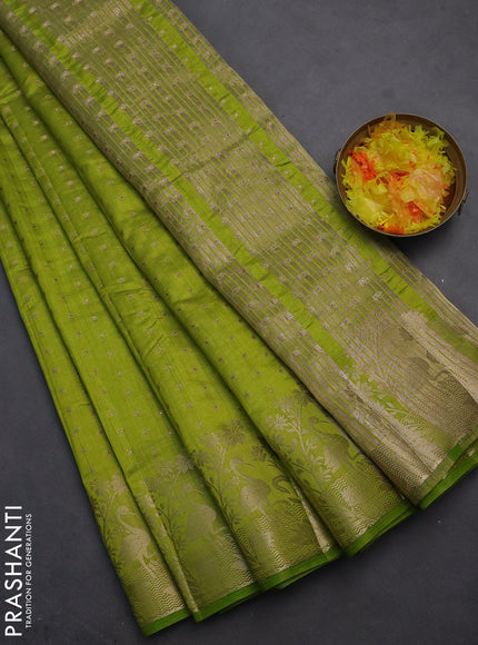 Semi raw silk saree light green with allover zari woven 1000 buttas and rich zari woven border