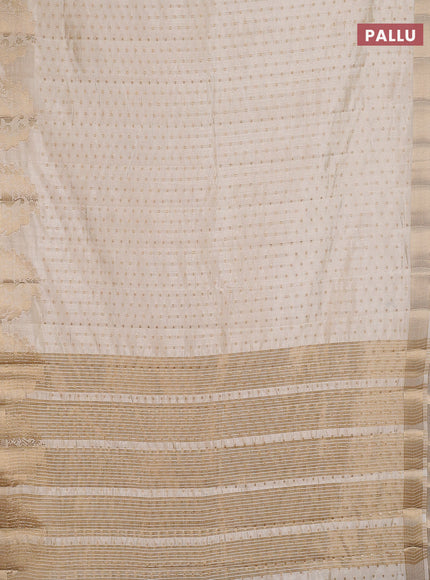 Semi raw silk saree cream with allover zari woven 1000 buttas and rich zari woven border