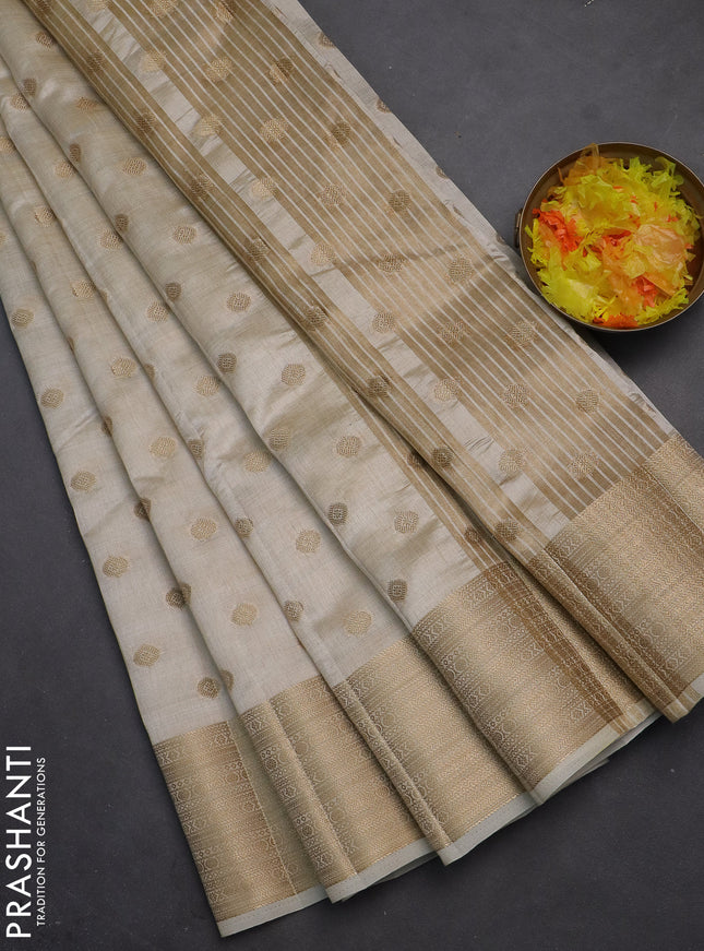 Semi raw silk saree cream with allover zari woven 1000 buttas and zari woven border