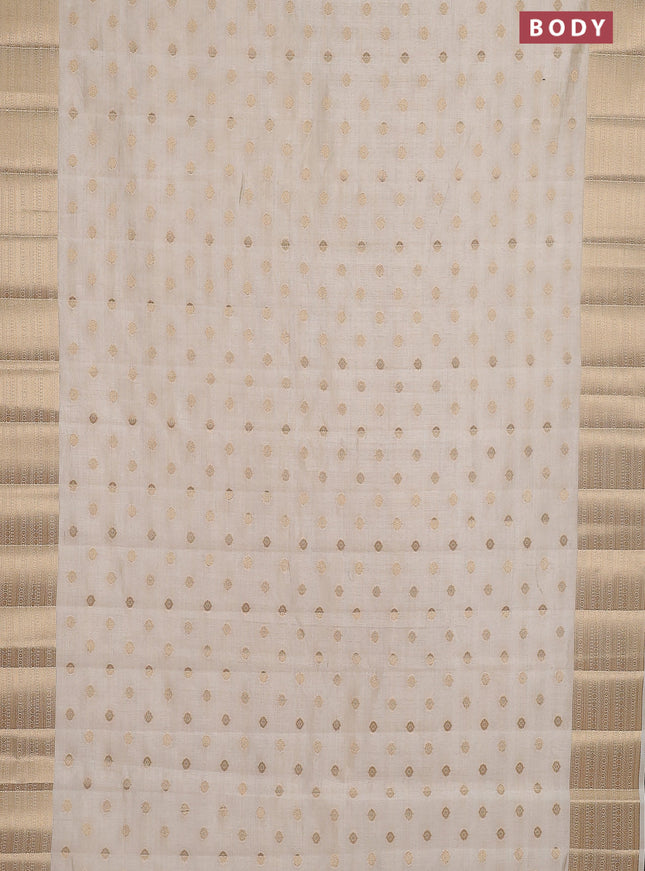 Semi raw silk saree cream with allover zari woven 1000 buttas and zari woven border