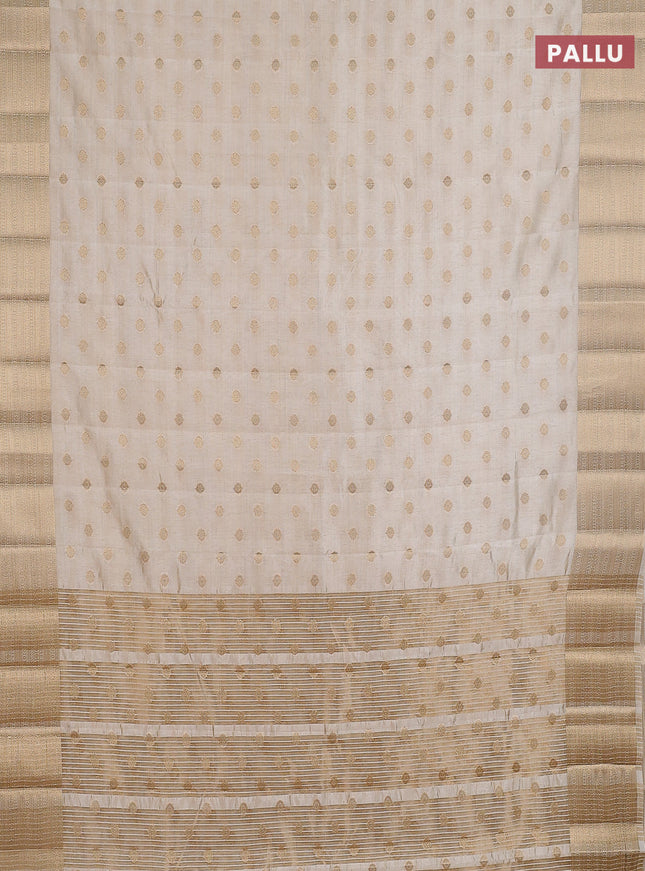 Semi raw silk saree cream with allover zari woven 1000 buttas and zari woven border