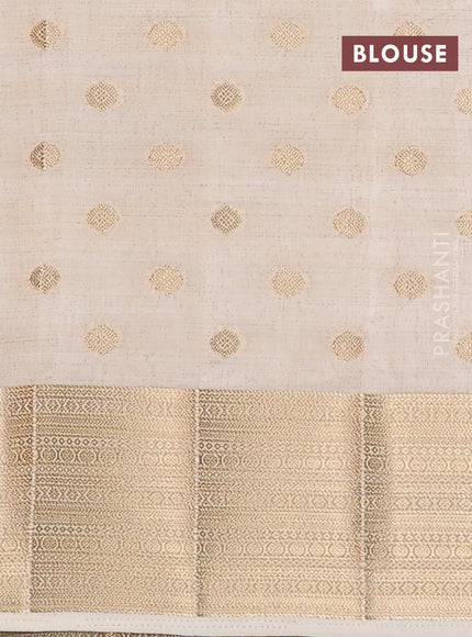 Semi raw silk saree cream with allover zari woven 1000 buttas and zari woven border