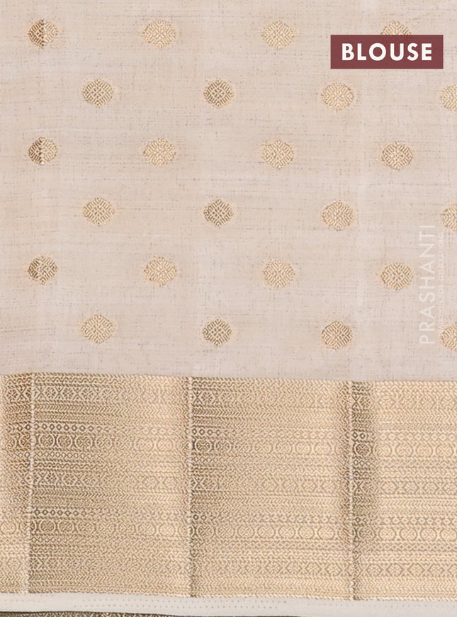 Semi raw silk saree cream with allover zari woven 1000 buttas and zari woven border