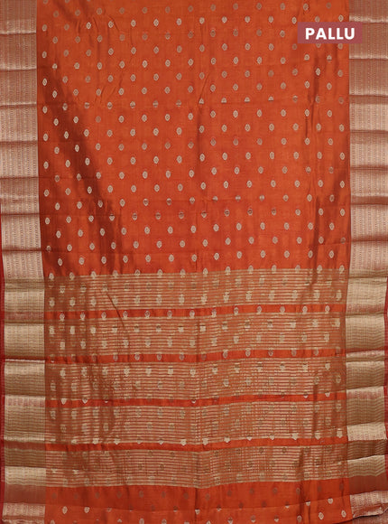 Semi raw silk saree orange with allover zari woven 1000 buttas and zari woven border