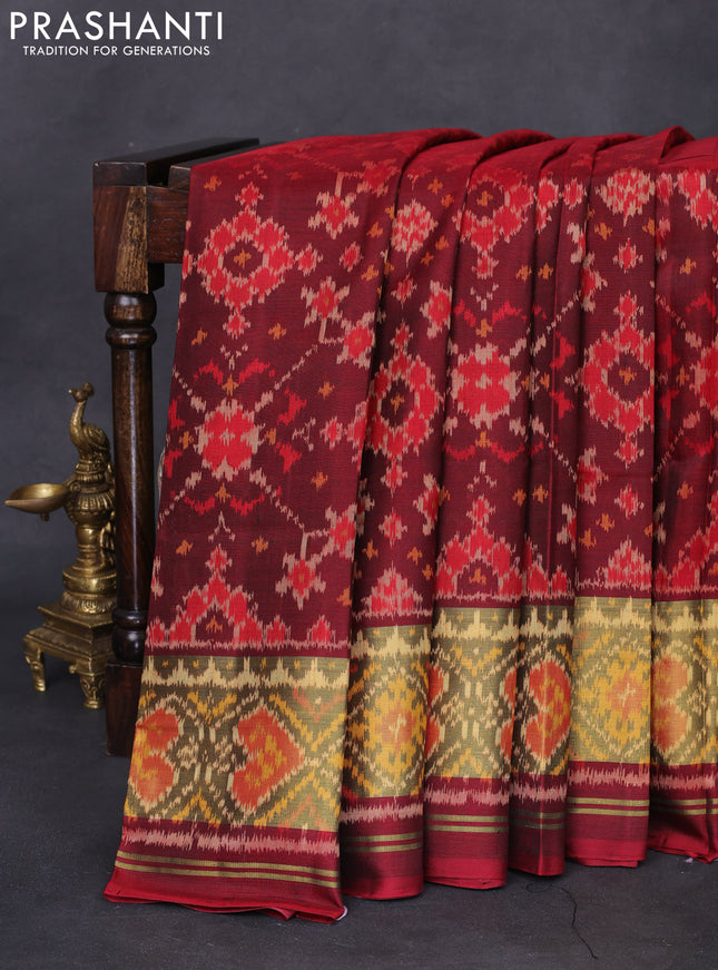 Rajkot patola silk saree deep maroon with allover ikat weaves and long zari woven border