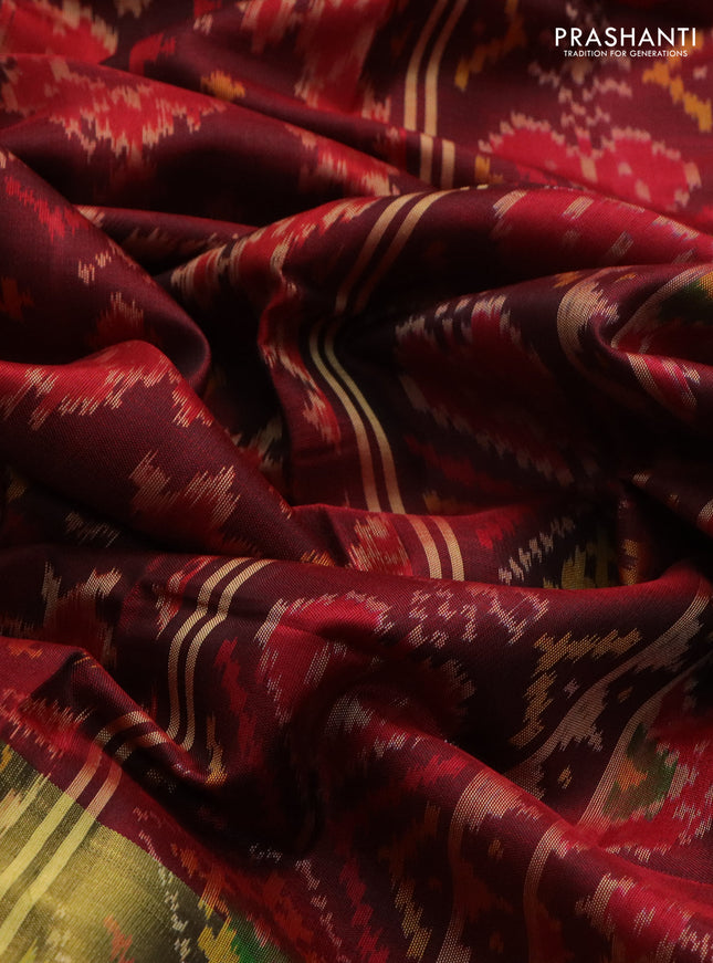 Rajkot patola silk saree deep maroon with allover ikat weaves and long zari woven border
