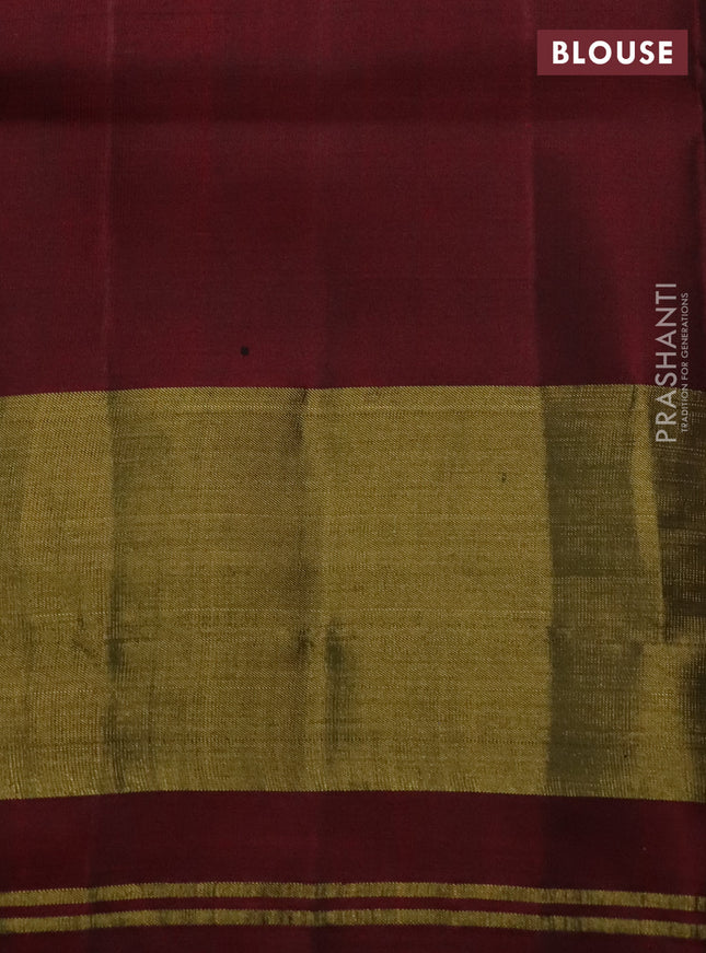 Rajkot patola silk saree deep maroon with allover ikat weaves and long zari woven border