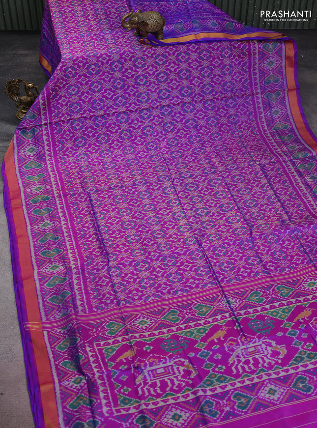 Rajkot patola silk saree dual shade of purple with allover ikat weaves and zari woven border