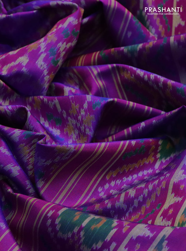 Rajkot patola silk saree dual shade of purple with allover ikat weaves and zari woven border