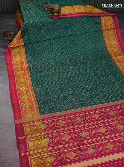 Rajkot patola silk saree green and pink with allover ikat weaves and long zari woven border