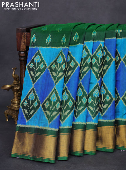 Rajkot patola silk saree green with allover ikat butta weaves and zari woven border