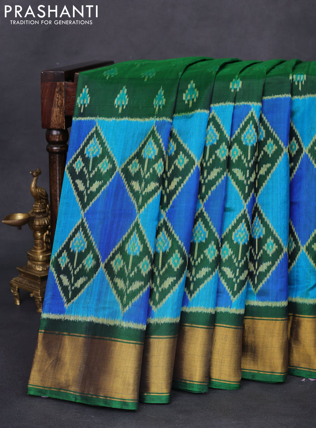 Rajkot patola silk saree green with allover ikat butta weaves and zari woven border