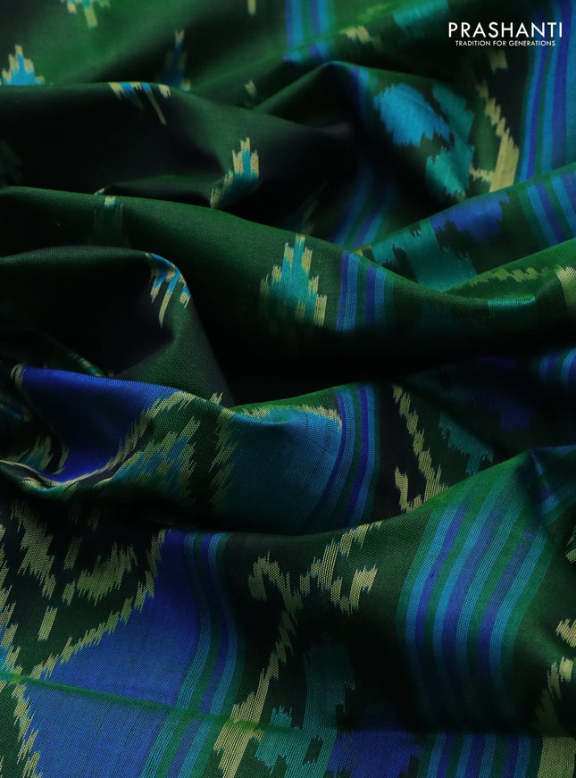 Rajkot patola silk saree green with allover ikat butta weaves and zari woven border