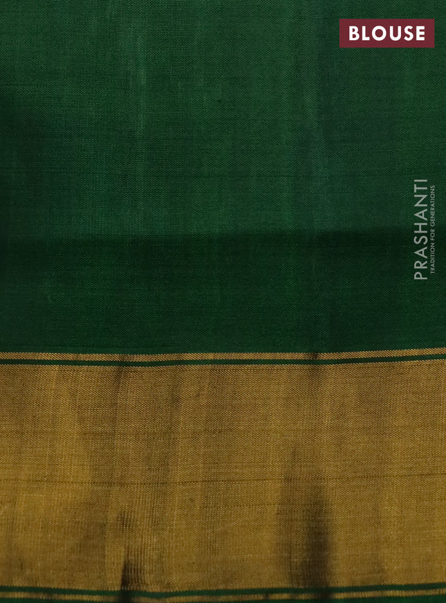 Rajkot patola silk saree green with allover ikat butta weaves and zari woven border