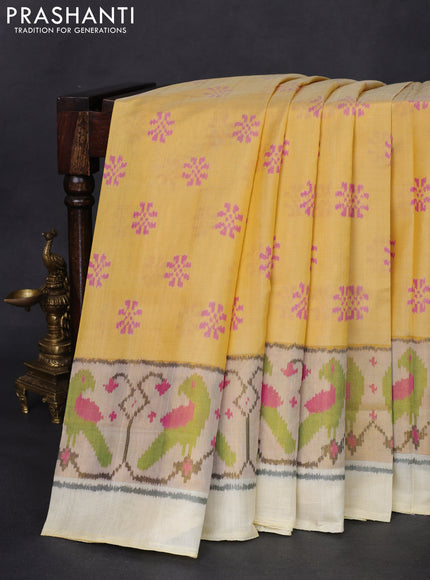 Rajkot patola silk saree cream with allover ikat weaves and long zari woven border