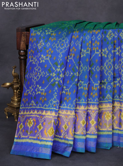 Rajkot patola silk saree dual shade of bluish green with allover ikat weaves and long zari woven border