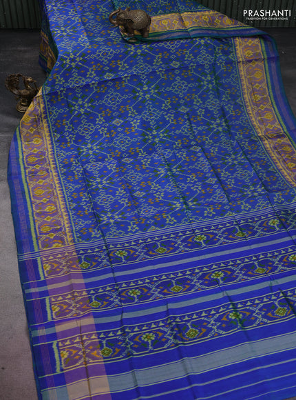 Rajkot patola silk saree dual shade of bluish green with allover ikat weaves and long zari woven border