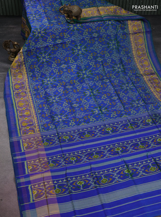 Rajkot patola silk saree dual shade of bluish green with allover ikat weaves and long zari woven border