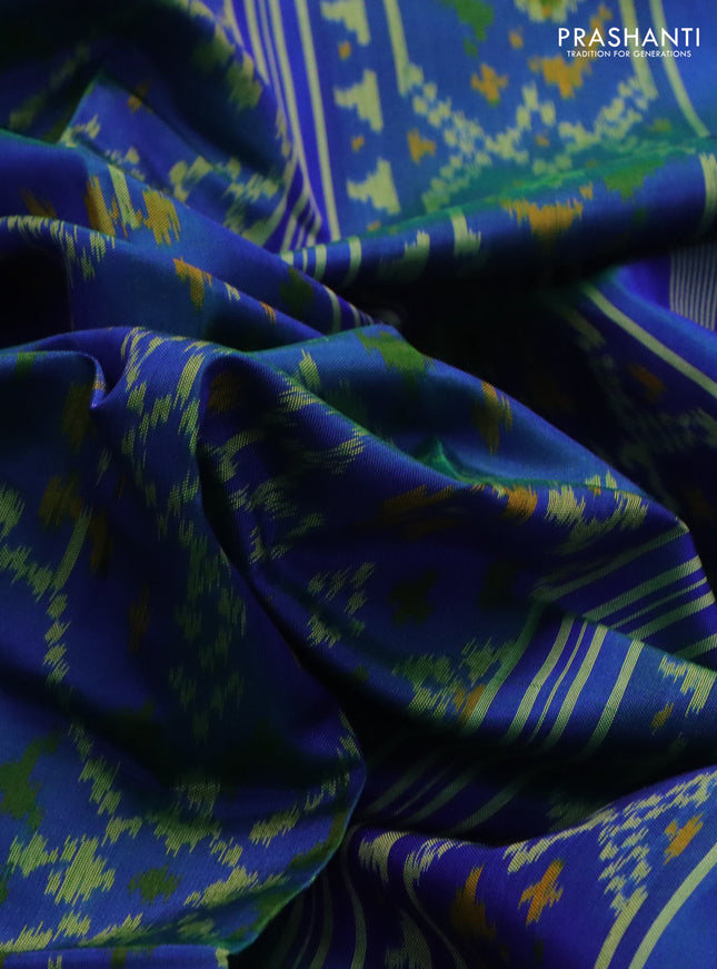 Rajkot patola silk saree dual shade of bluish green with allover ikat weaves and long zari woven border