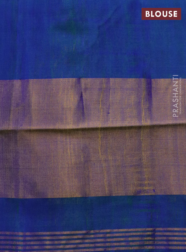 Rajkot patola silk saree dual shade of bluish green with allover ikat weaves and long zari woven border