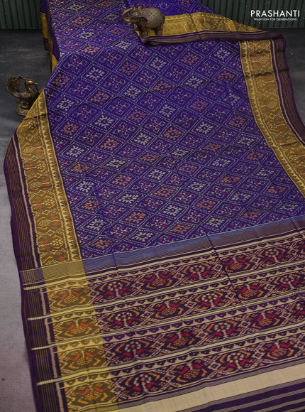 Rajkot patola silk saree blue and violet with allover ikat weaves and zari woven border