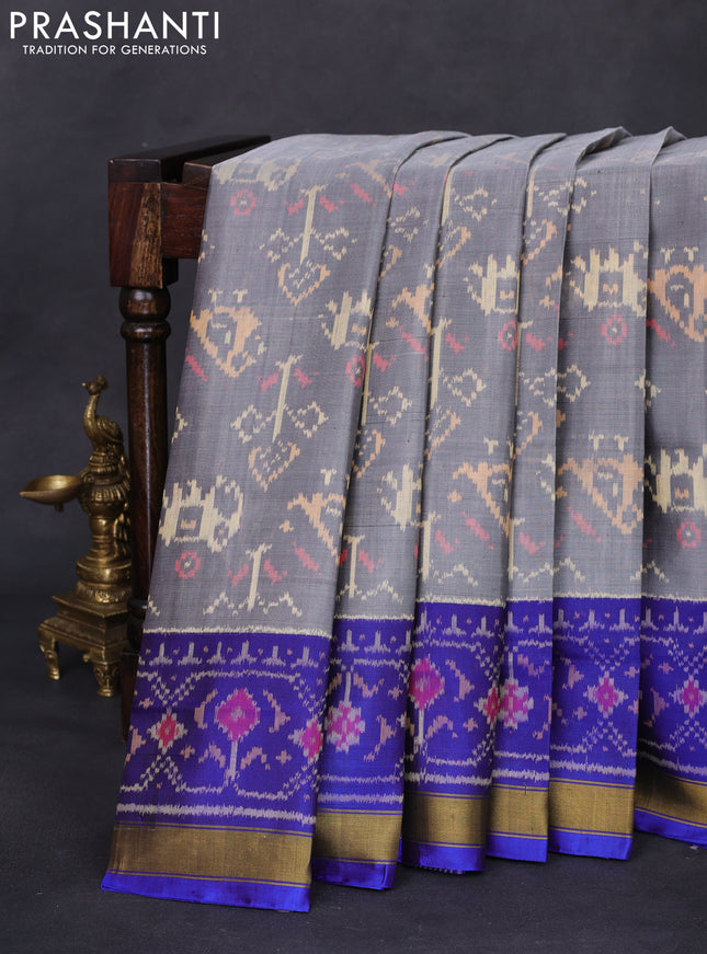 Rajkot patola silk saree grey and blue with allover ikat weaves and zari woven border