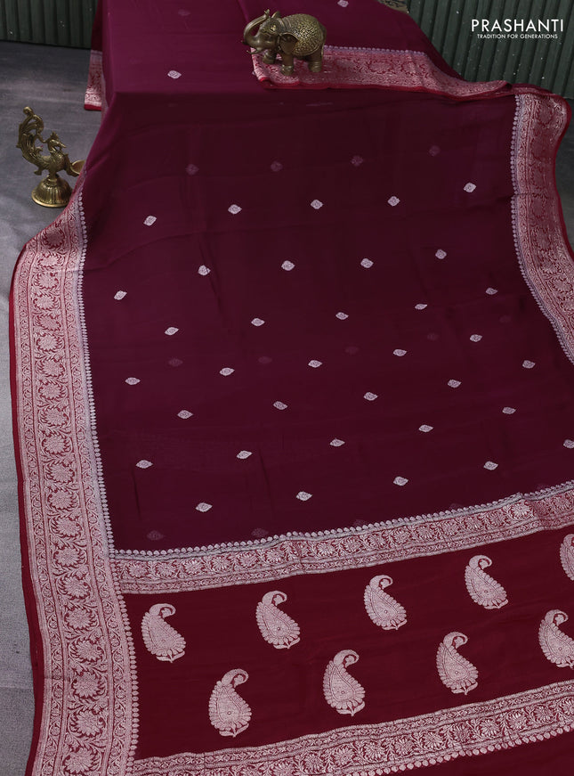 Banarasi chiffon silk saree wine shade and maroon with silver zari woven buttas and floral silver zari woven border