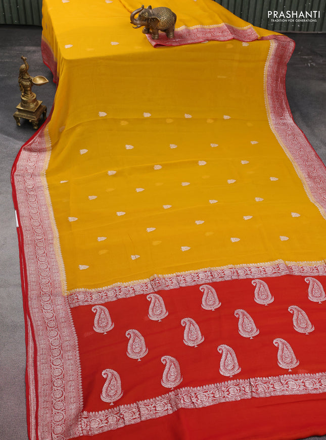 Banarasi chiffon silk saree mustard yellow and red with silver zari woven buttas and floral silver zari woven border