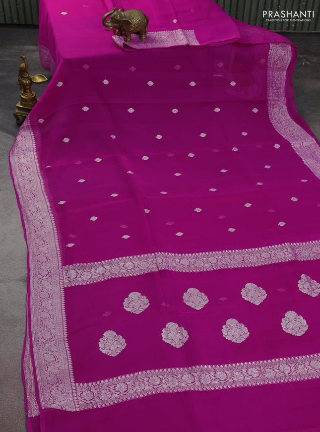 Banarasi chiffon silk saree magenta pink with silver zari woven buttas and floral silver zari woven border