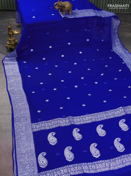 Banarasi chiffon silk saree royal blue with silver zari woven buttas and floral silver zari woven border