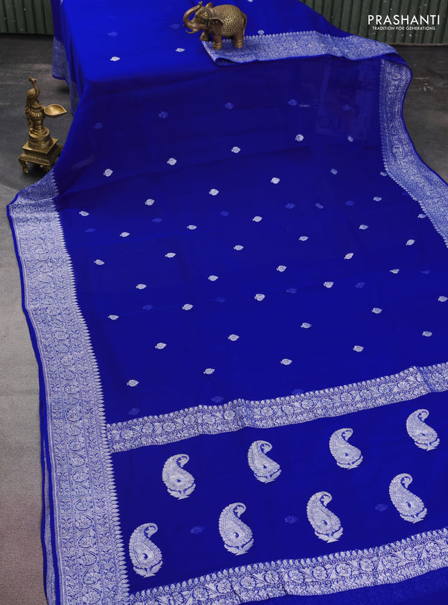 Banarasi chiffon silk saree royal blue with silver zari woven buttas and floral silver zari woven border