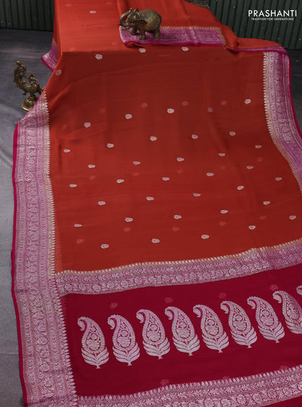 Banarasi chiffon silk saree rust shade and magenta pink with silver zari woven buttas and floral silver zari woven border